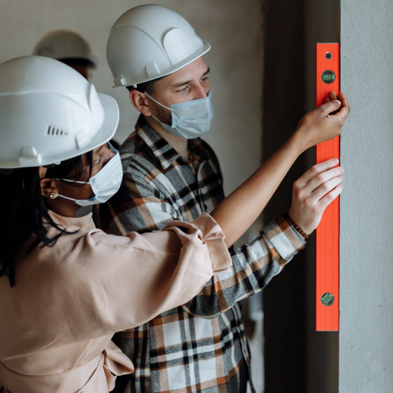 Project manager reviewing construction plans